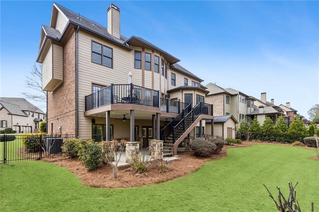 2391 Hopehaven Way Hoschton, GA 30548 - Photo 76 of 87 a front view of a house with a yard