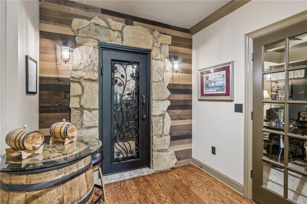 2391 Hopehaven Way Hoschton, GA 30548 - Photo 10 of 87 a living room with furniture and a potted plant