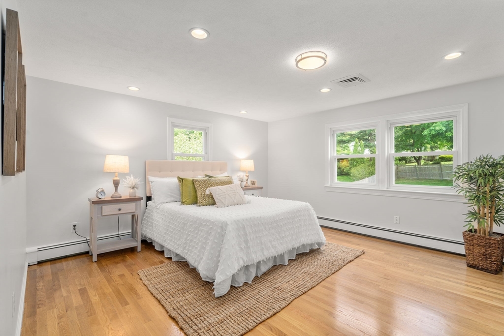 18 Julia Road Needham, MA 02492 - Photo 20 of 41 a bedroom with a bed and a window