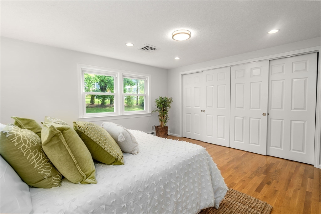 18 Julia Road Needham, MA 02492 - Photo 21 of 41 a bedroom with a bed and a window