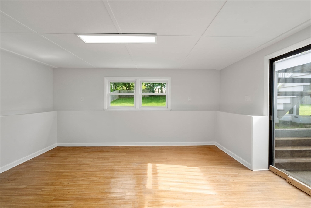 18 Julia Road Needham, MA 02492 - Photo 29 of 41 a view of an empty room with a window