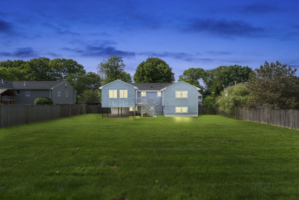 18 Julia Road Needham, MA 02492 - Photo 40 of 41 a front view of a house with a garden