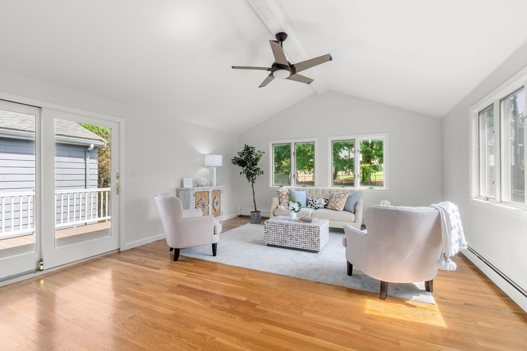 18 Julia Road Needham, MA 02492 - Photo 8 of 41 a living room with furniture and a large window
