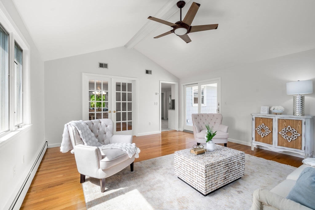 18 Julia Road Needham, MA 02492 - Photo 10 of 41 a living room with furniture and a large window