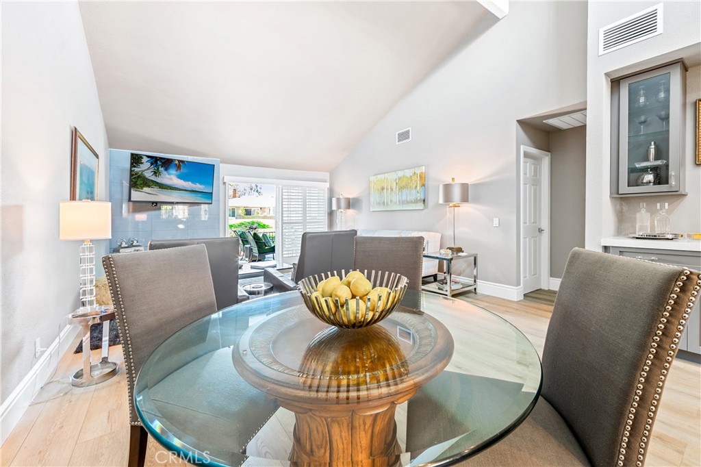 17294 Citron Irvine, CA 92612 - Photo 11 of 26 a living room with furniture and a chandelier