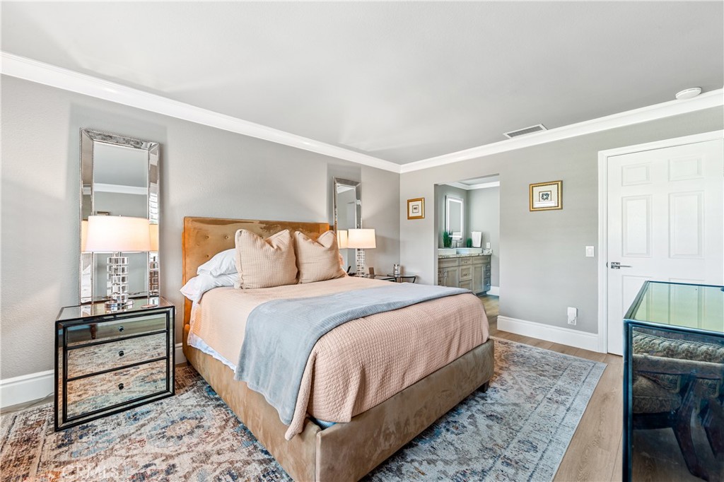17294 Citron Irvine, CA 92612 - Photo 14 of 26 a bedroom with a bed and a television