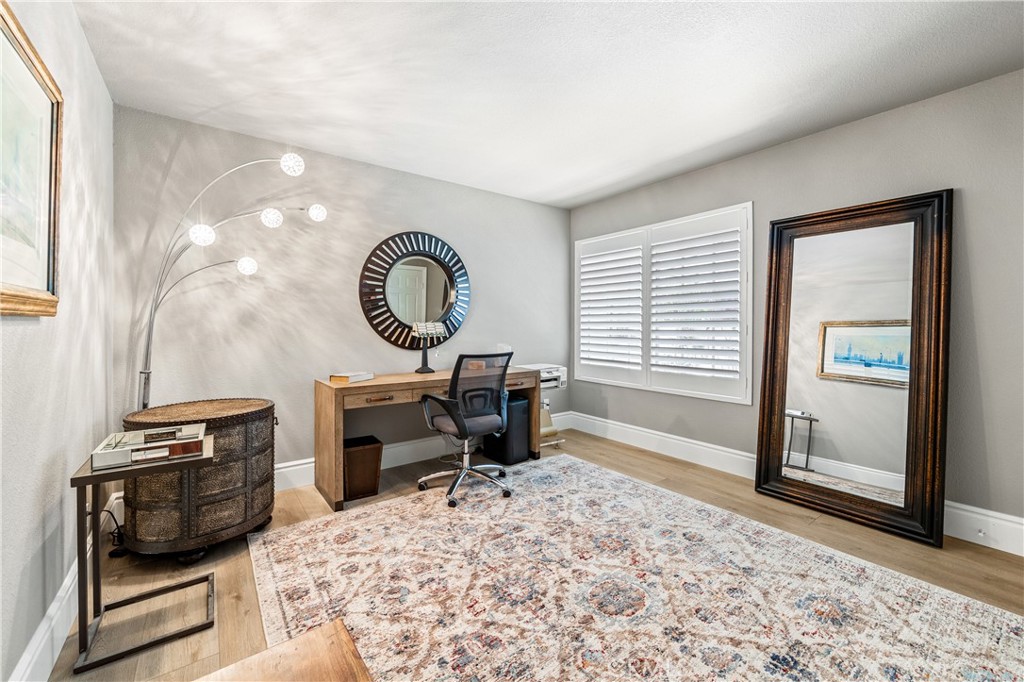 17294 Citron Irvine, CA 92612 - Photo 17 of 26 a living room with a couch a rug and a window