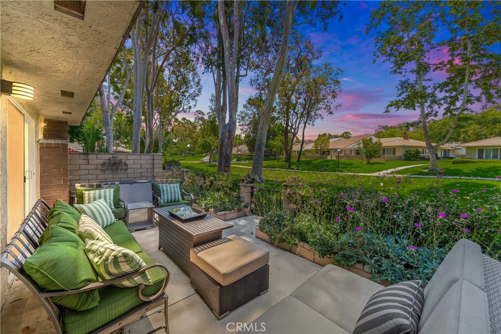 17294 Citron Irvine, CA 92612 - Photo 21 of 26 a view of a patio with couches table and chairs and potted plants