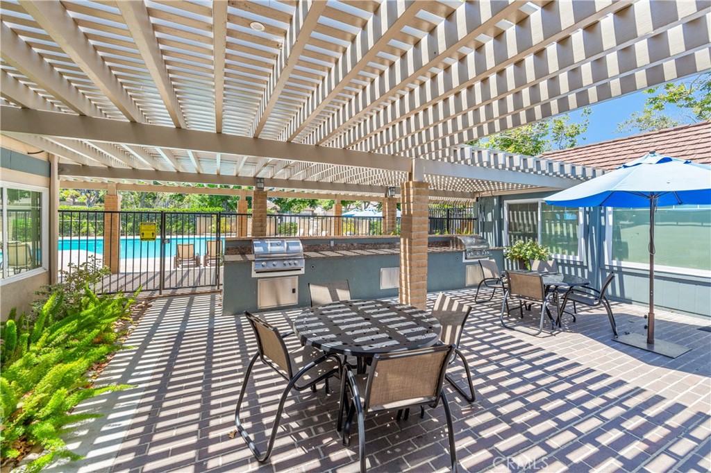 17294 Citron Irvine, CA 92612 - Photo 23 of 26 a outdoor space with lots of tables a garden and chairs