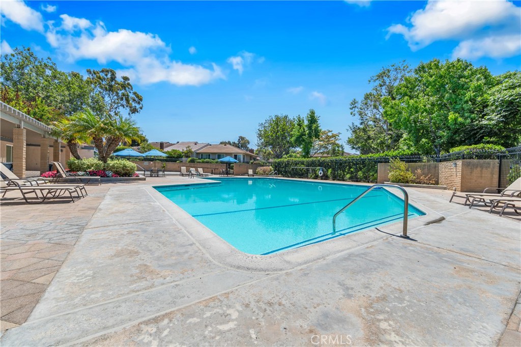 17294 Citron Irvine, CA 92612 - Photo 24 of 26 a view of a tennis ground with large trees