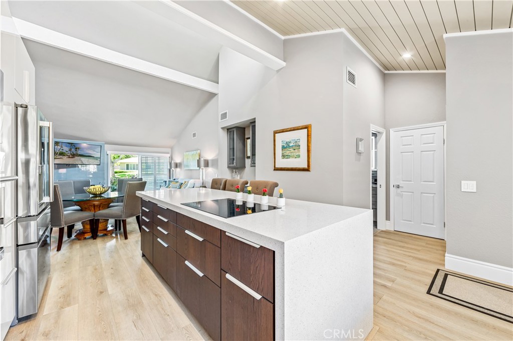 17294 Citron Irvine, CA 92612 - Photo 10 of 26 a large kitchen with a table and chairs