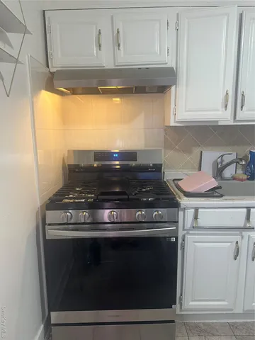 a bathroom with a sink and toilet