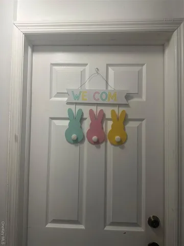 a bathroom with a sink a mirror and cabinets