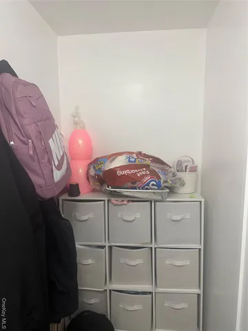 a stove top oven sitting inside of a kitchen