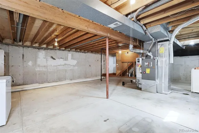 a view of empty room with wooden walls