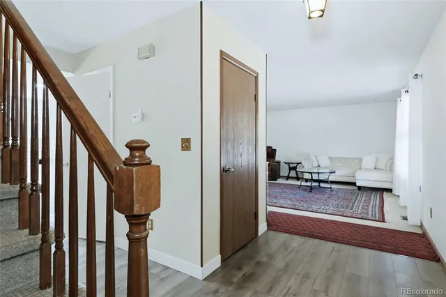 a view of a kitchen from the hallway