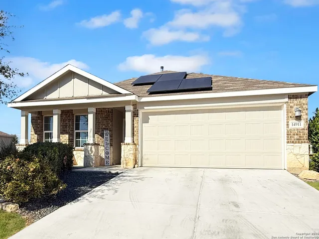 a view of house with yard