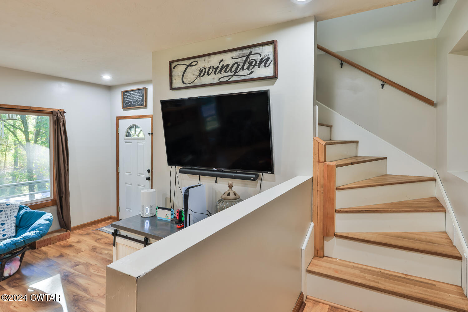 433 Jolly Springs Road Dresden, TN 38225 - Photo 23 of 64 a living room with furniture and a flat screen tv