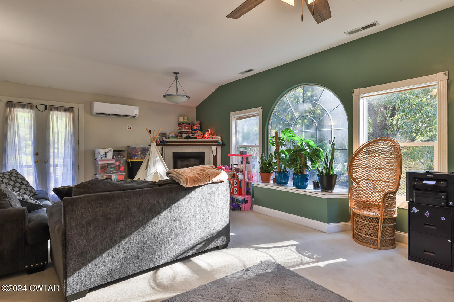 433 Jolly Springs Road Dresden, TN 38225 - Photo 24 of 64 a living room with furniture a window and a chandelier