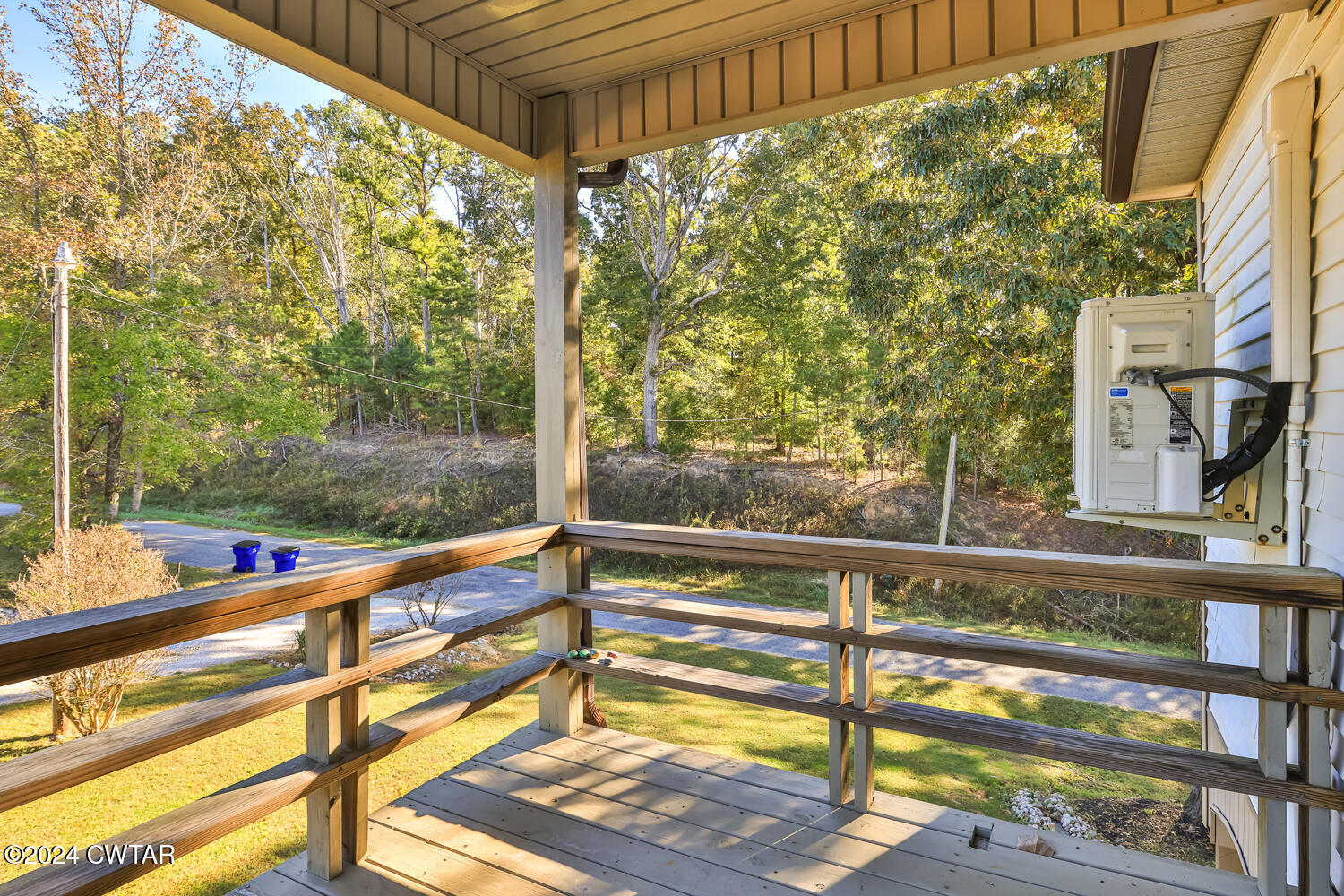 433 Jolly Springs Road Dresden, TN 38225 - Photo 29 of 64 a view of a porch and wooden floor