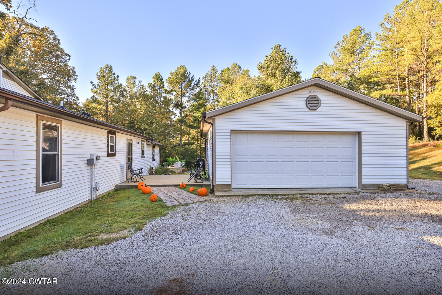 433 Jolly Springs Road Dresden, TN 38225 - Photo 30 of 64 a front view of a house with a yard and garage