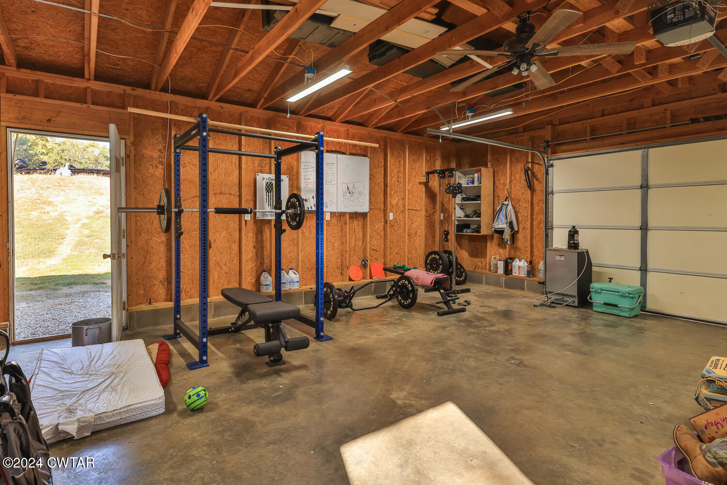 433 Jolly Springs Road Dresden, TN 38225 - Photo 32 of 64 a view of gym with large windows