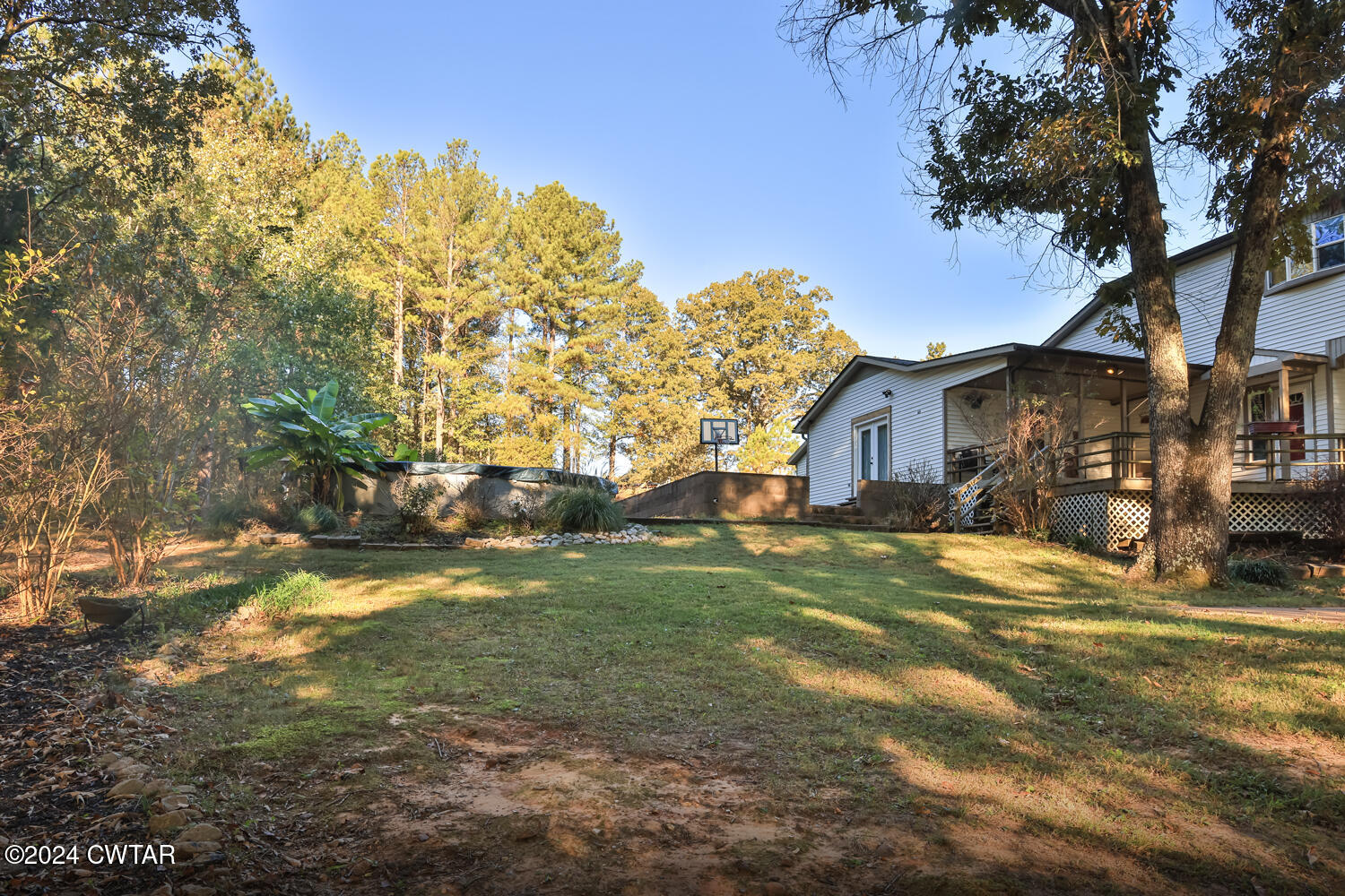 433 Jolly Springs Road Dresden, TN 38225 - Photo 33 of 64 a view of a house with a yard