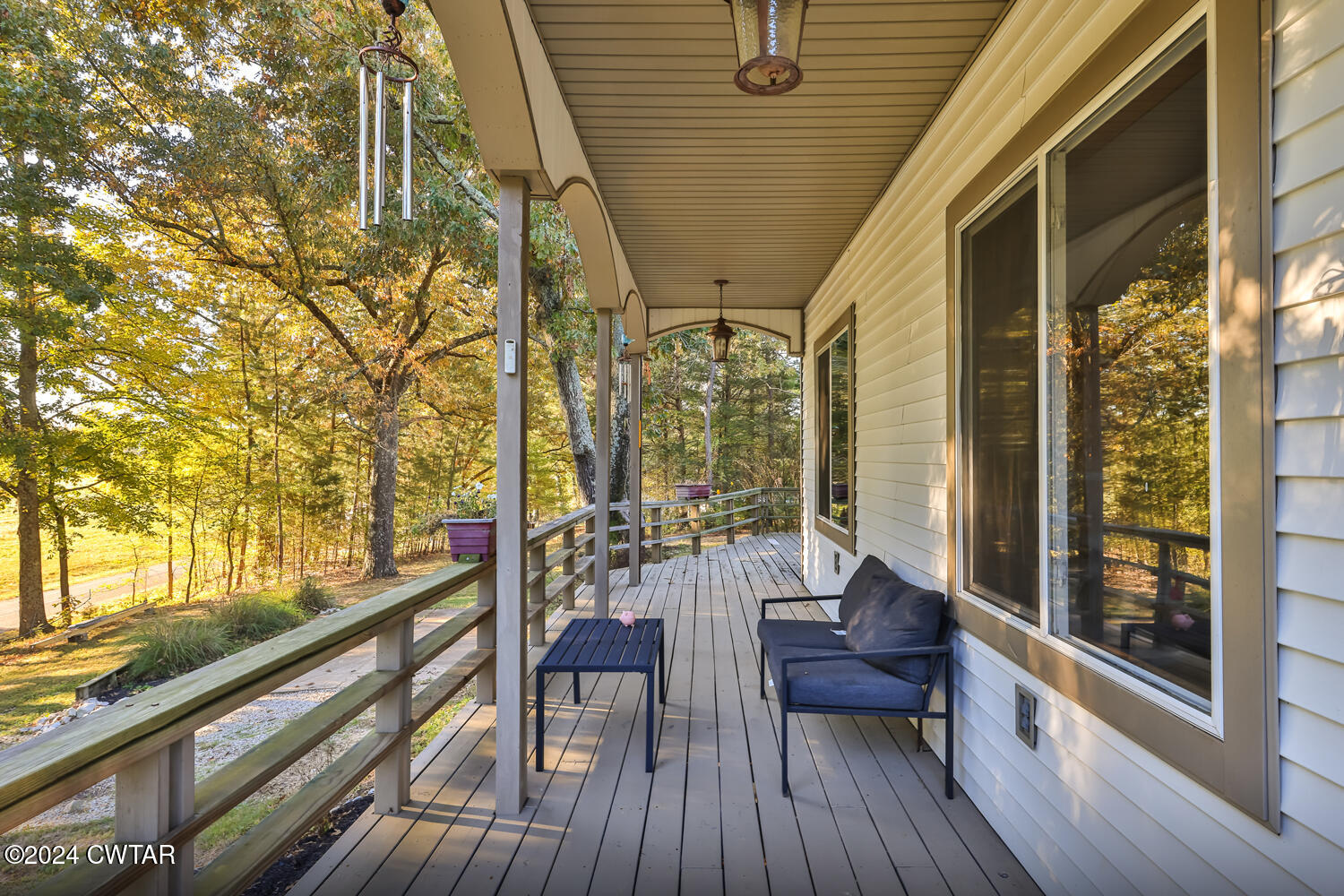 433 Jolly Springs Road Dresden, TN 38225 - Photo 45 of 64 a view of balcony with chairs and wooden fence