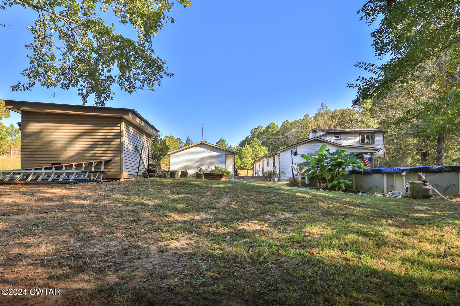 433 Jolly Springs Road Dresden, TN 38225 - Photo 50 of 64 a view of a house with a yard
