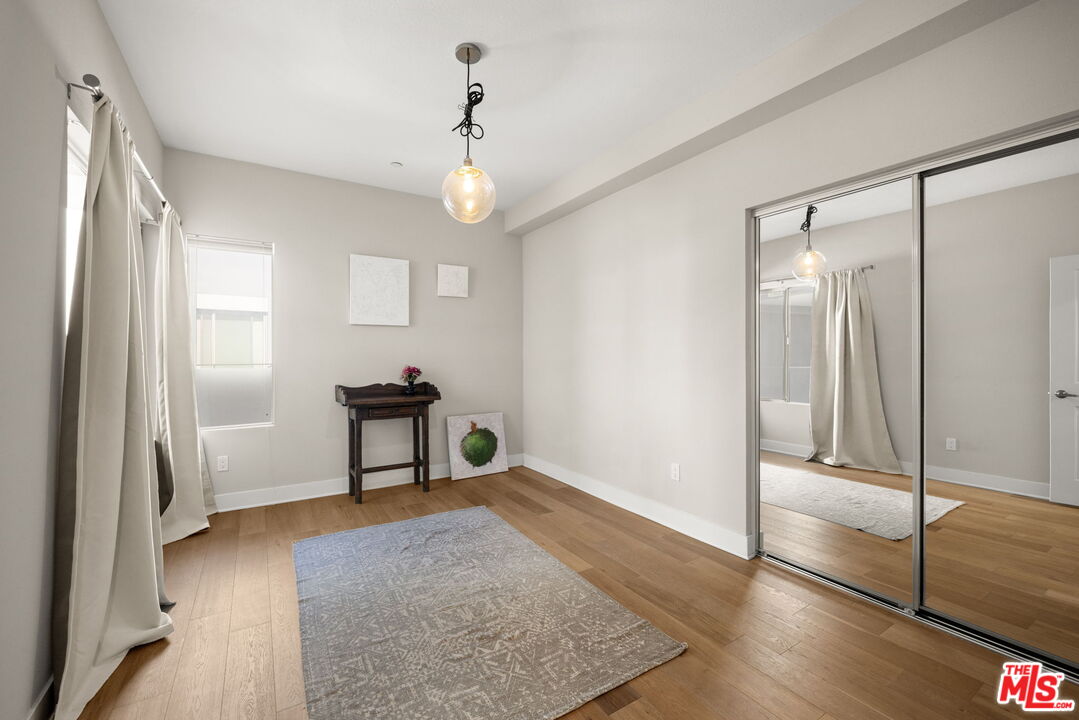 13337 Beach Avenue, Unit 406 Marina del Rey, CA 90292 - Photo 16 of 23 a view of a livingroom with a furniture and windows