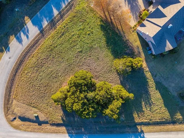 a view of a sign of a lake next to a building