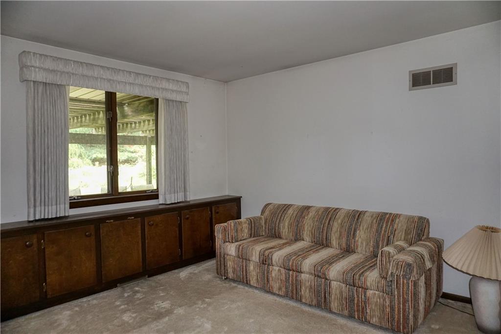 142 Wise Road Butler, PA 16002 - Photo 30 of 36 a living room with furniture and a window
