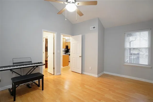 a view of an empty room with a window