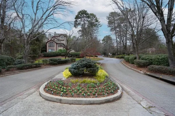 a view of a backyard of the house