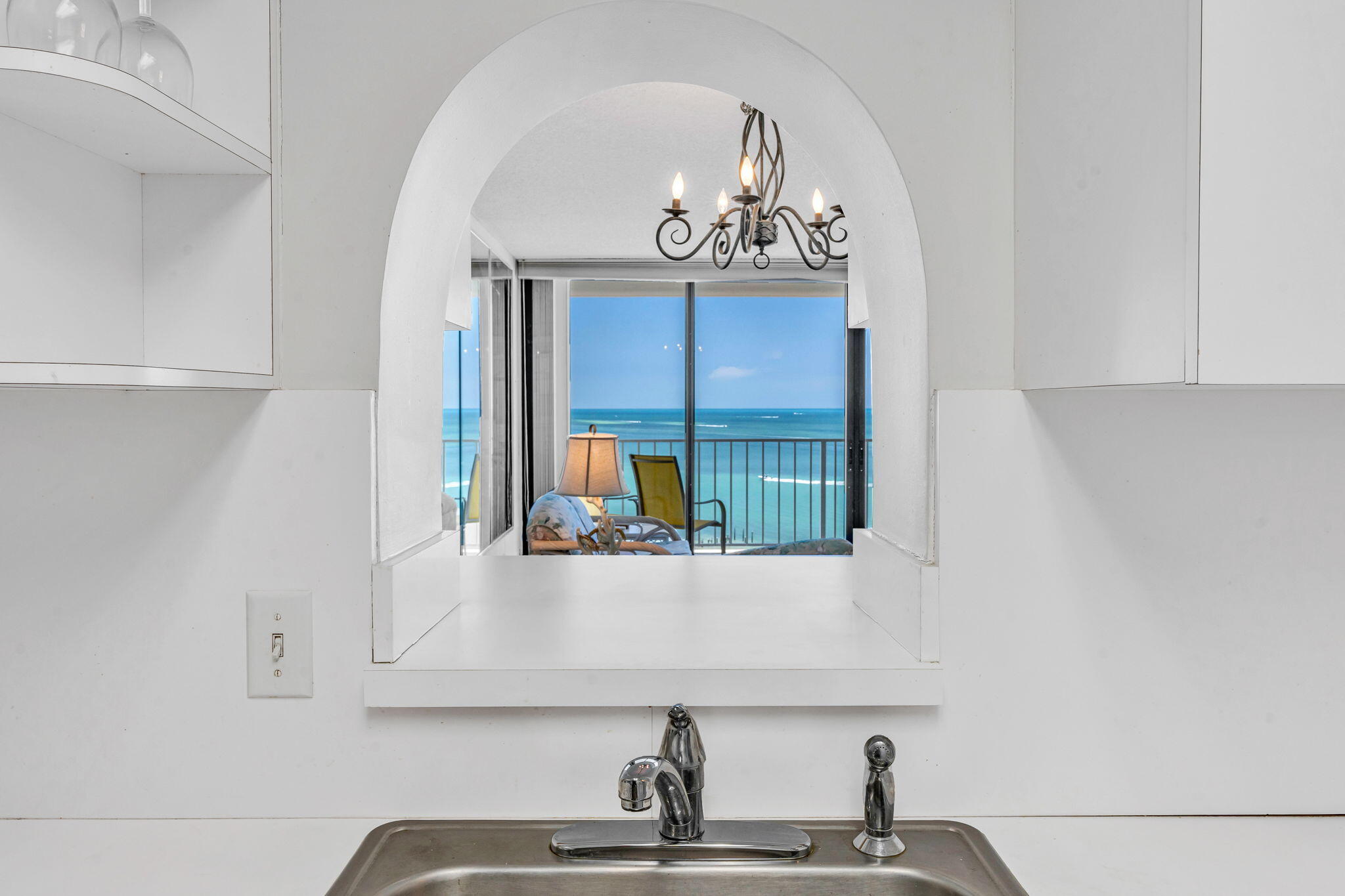 2000 Coco Plum Drive, Unit 1202 Marathon, FL 33050 - Photo 14 of 44 a bathroom with a sink and a mirror