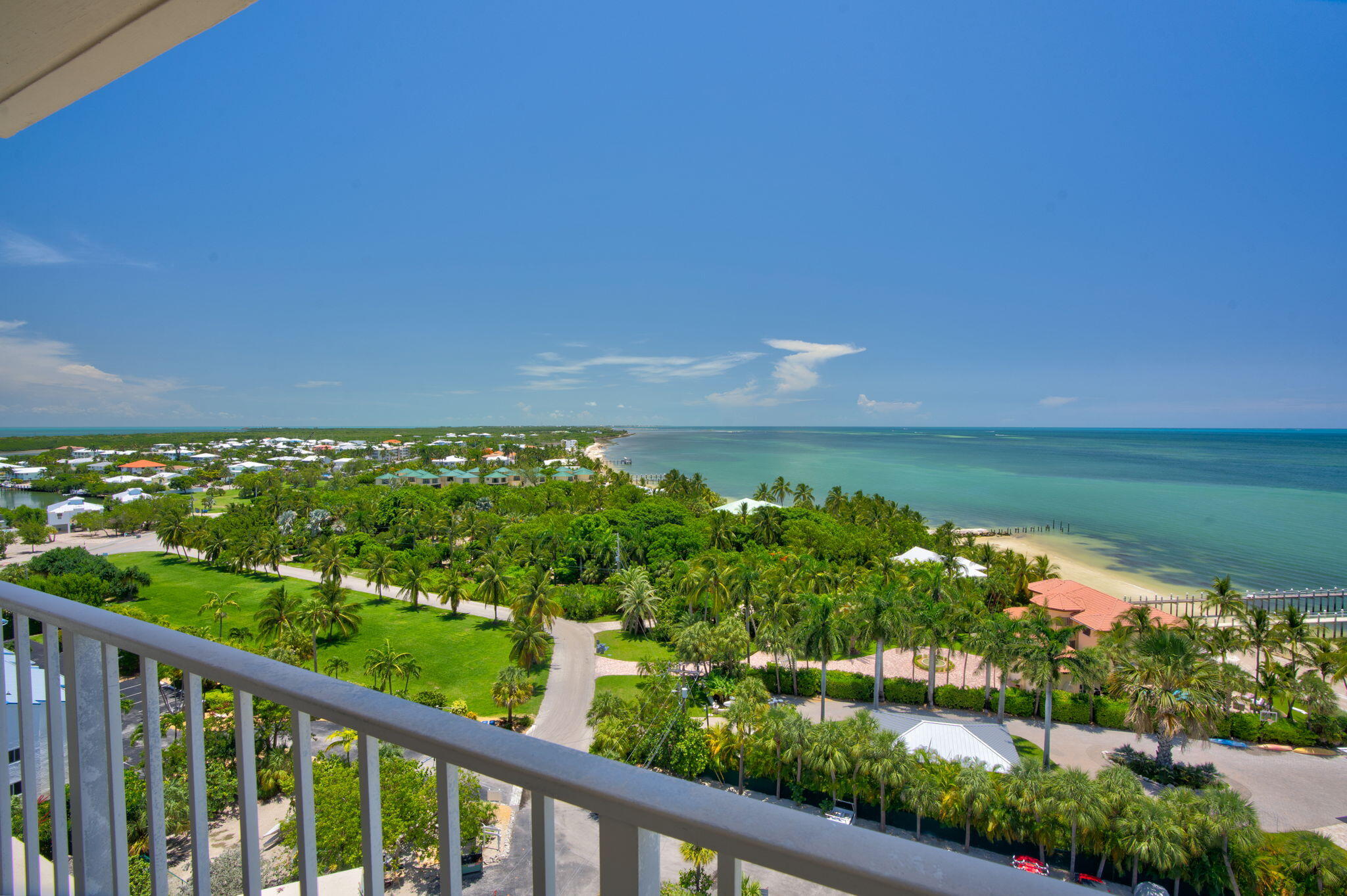 2000 Coco Plum Drive, Unit 1202 Marathon, FL 33050 - Photo 17 of 44 a view of a city from a balcony