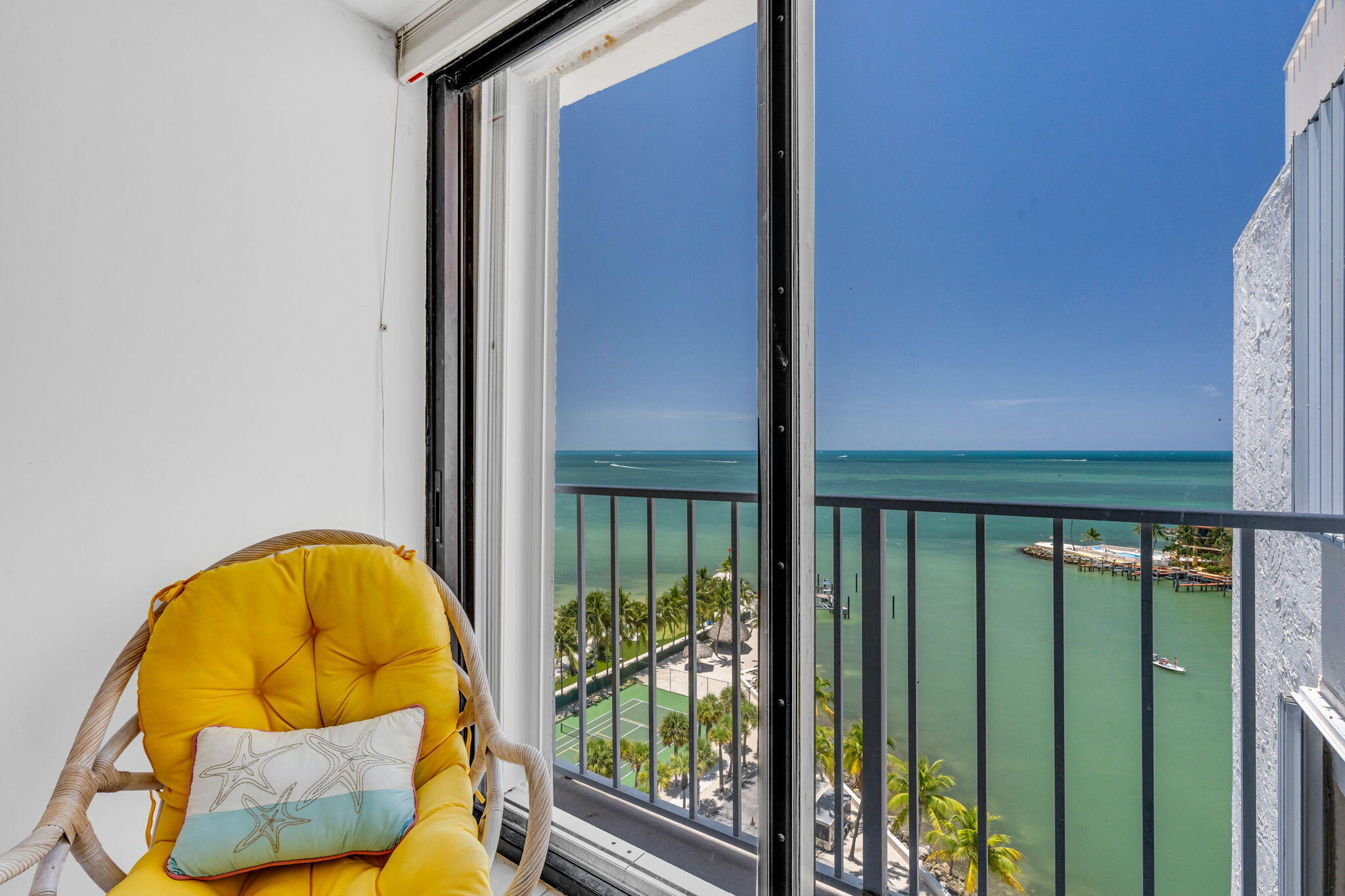 2000 Coco Plum Drive, Unit 1202 Marathon, FL 33050 - Photo 21 of 44 a view of balcony and swimming pool
