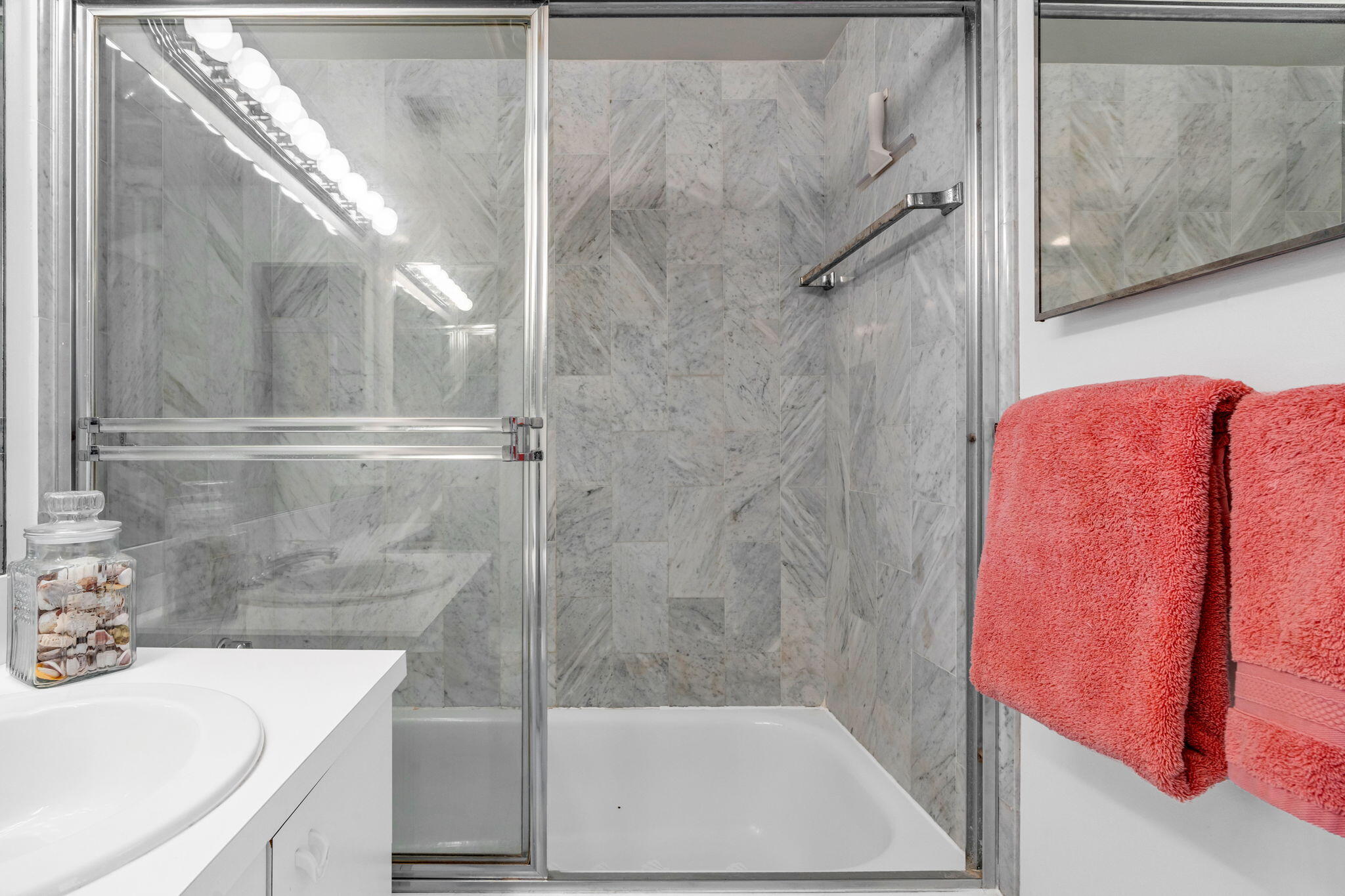 2000 Coco Plum Drive, Unit 1202 Marathon, FL 33050 - Photo 24 of 44 a bathroom with a sink and a shower