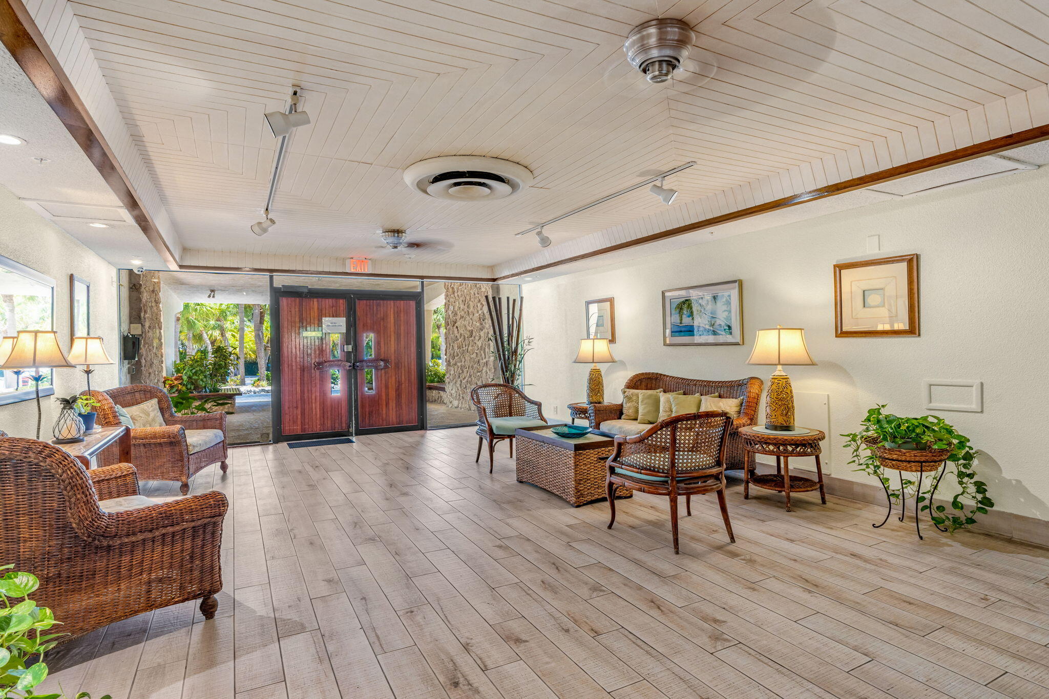 2000 Coco Plum Drive, Unit 1202 Marathon, FL 33050 - Photo 31 of 44 a living room with furniture and wooden floor