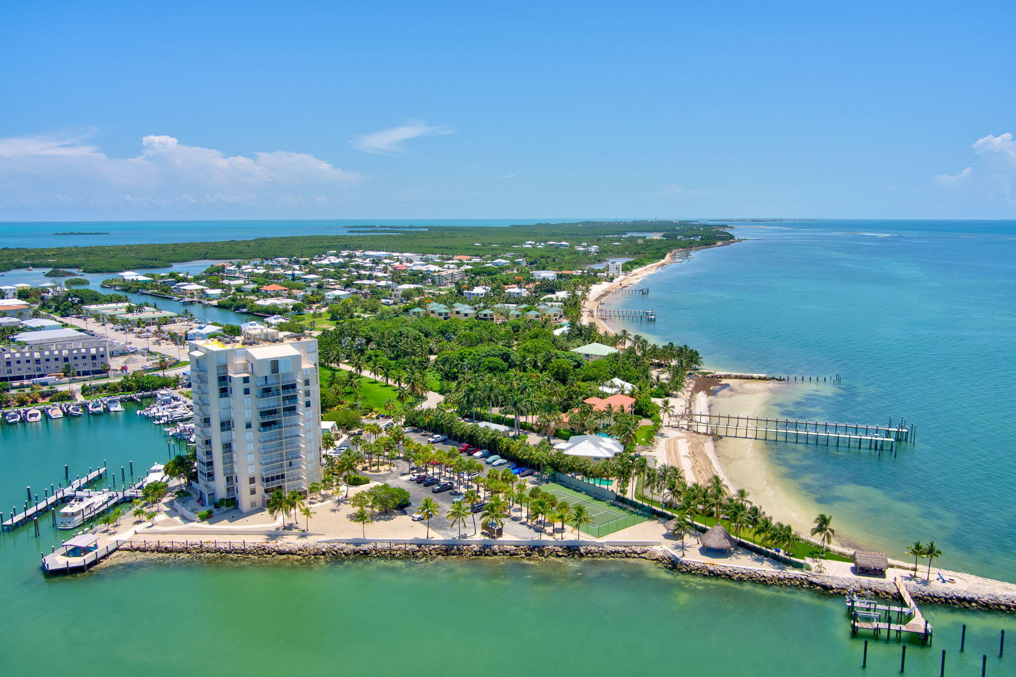 2000 Coco Plum Drive, Unit 1202 Marathon, FL 33050 - Photo 43 of 44 a view of a lake with a city