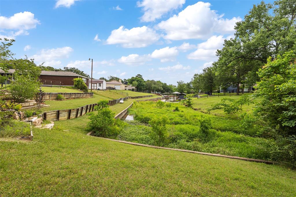 713 Midway Road Tool, TX 75143 - Photo 24 of 28 a view of an outdoor space and swimming pool