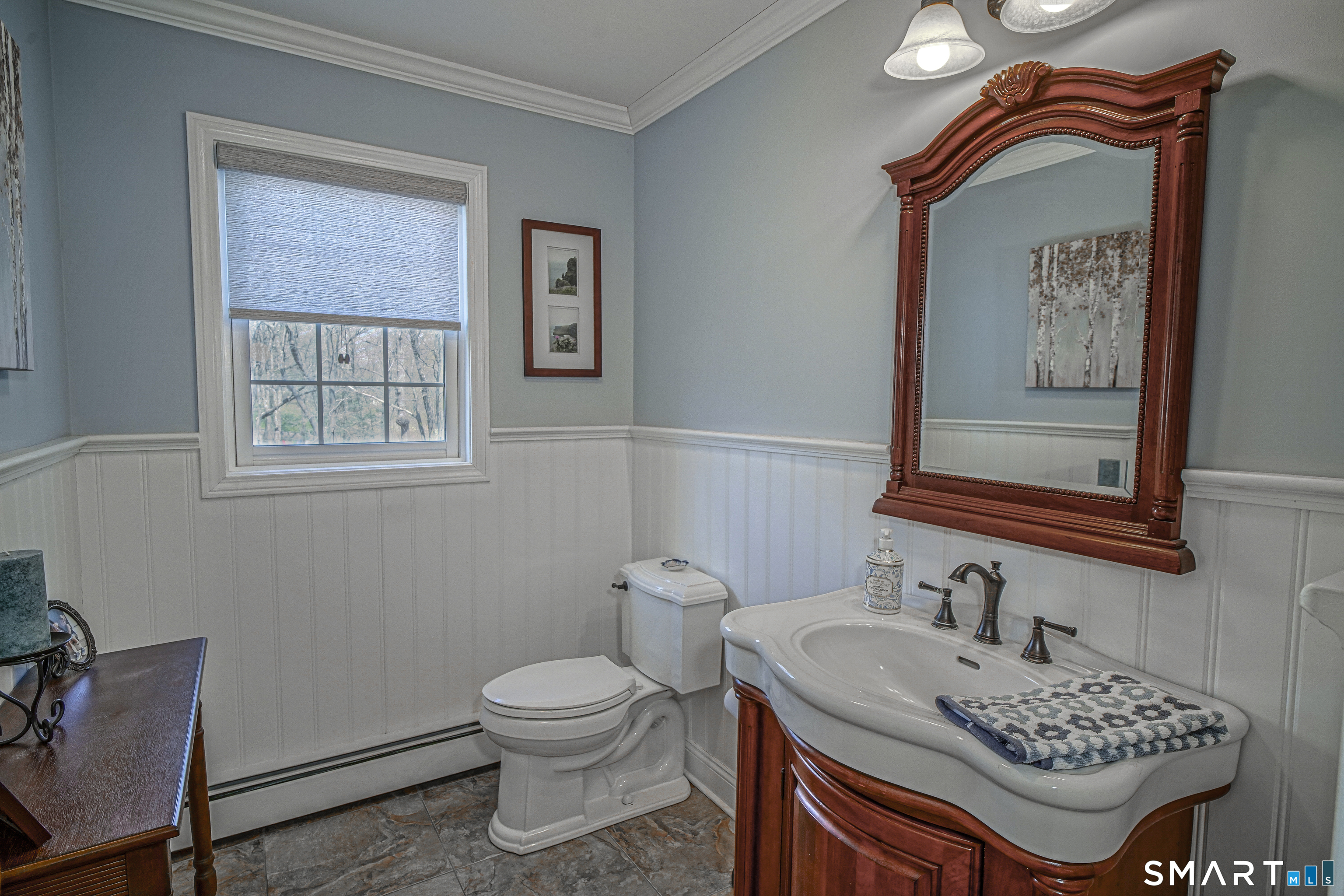 20 Stephen Court Prospect, CT 06712 - Photo 12 of 39 First-floor remodeled guest bathroom with tiled floor.