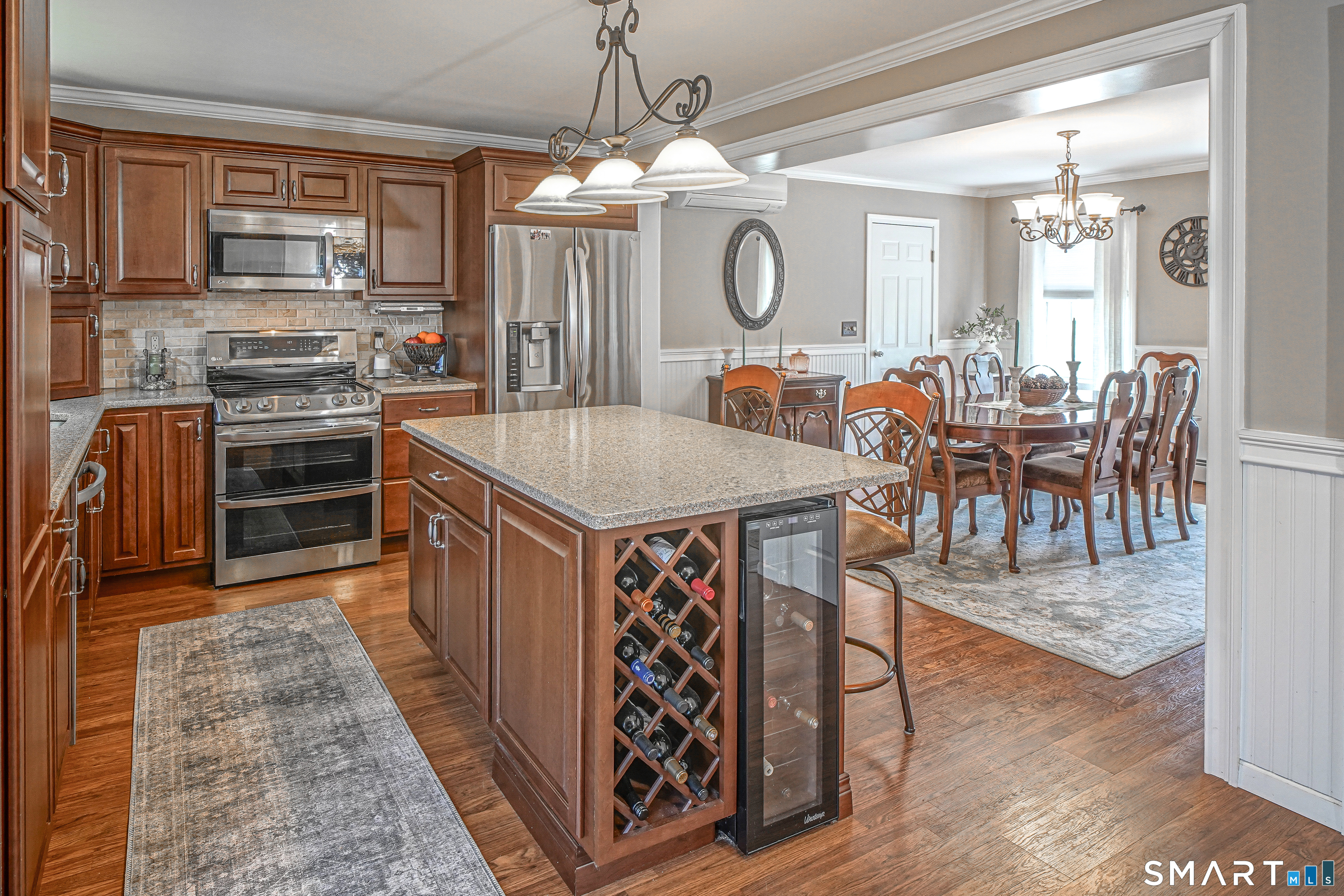 20 Stephen Court Prospect, CT 06712 - Photo 2 of 39 Remodeled kitchen open to dining room.