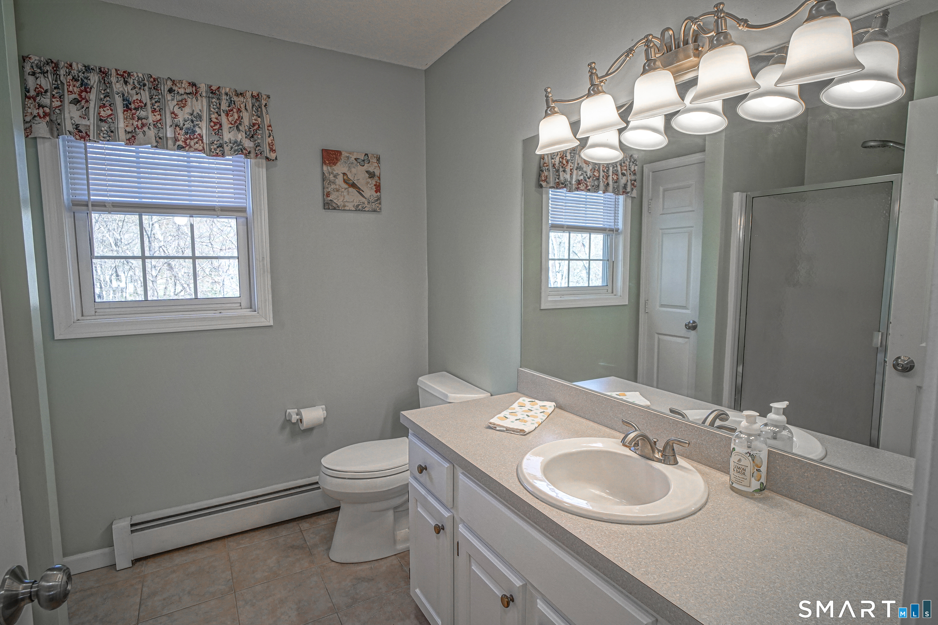 20 Stephen Court Prospect, CT 06712 - Photo 23 of 39 The main full bathroom is located on the second level and features a glass door on the shower and tiled flooring.