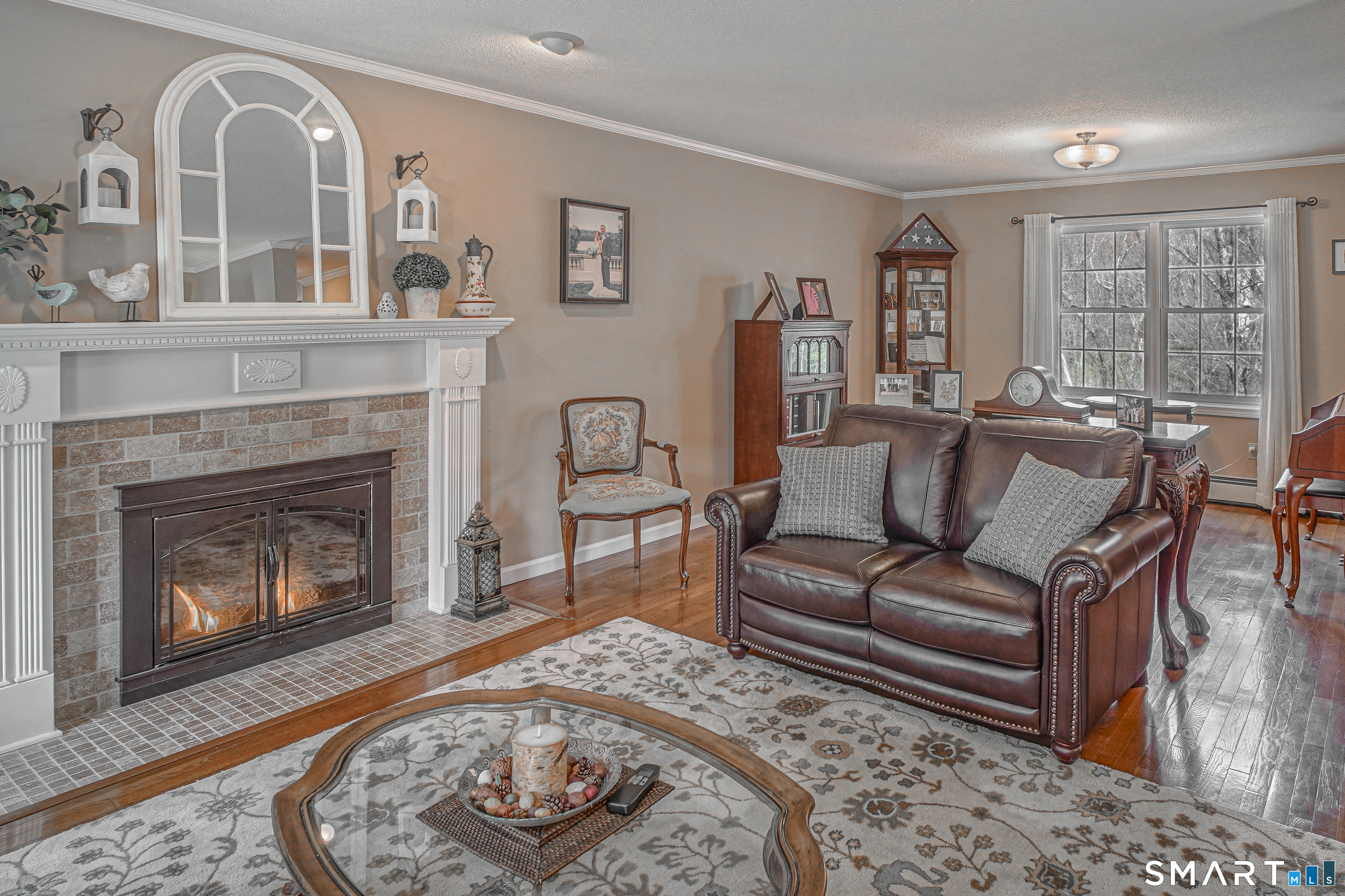 20 Stephen Court Prospect, CT 06712 - Photo 3 of 39 Enjoy 2 gathering areas in our Great Room with a gas fireplace and wood floors.
