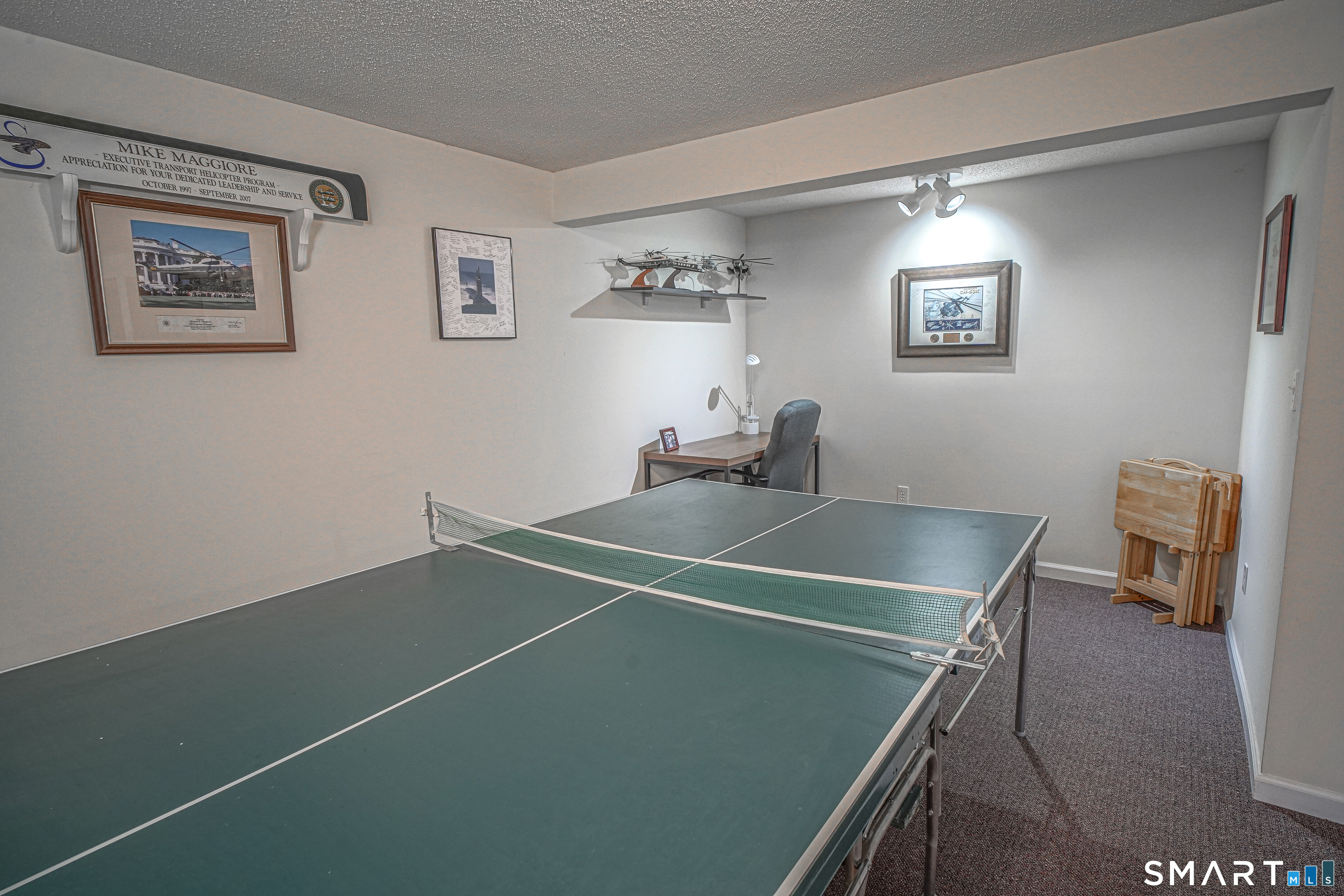 20 Stephen Court Prospect, CT 06712 - Photo 29 of 39 Plenty of room to enjoy games in the lower-level family room.