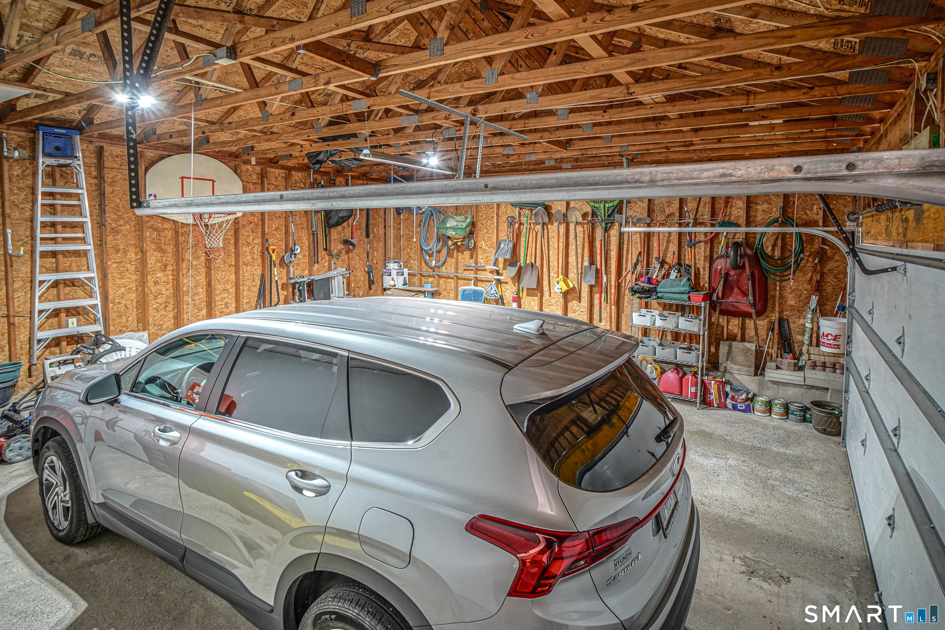 20 Stephen Court Prospect, CT 06712 - Photo 32 of 39 A two-car garage with an updated garage door.