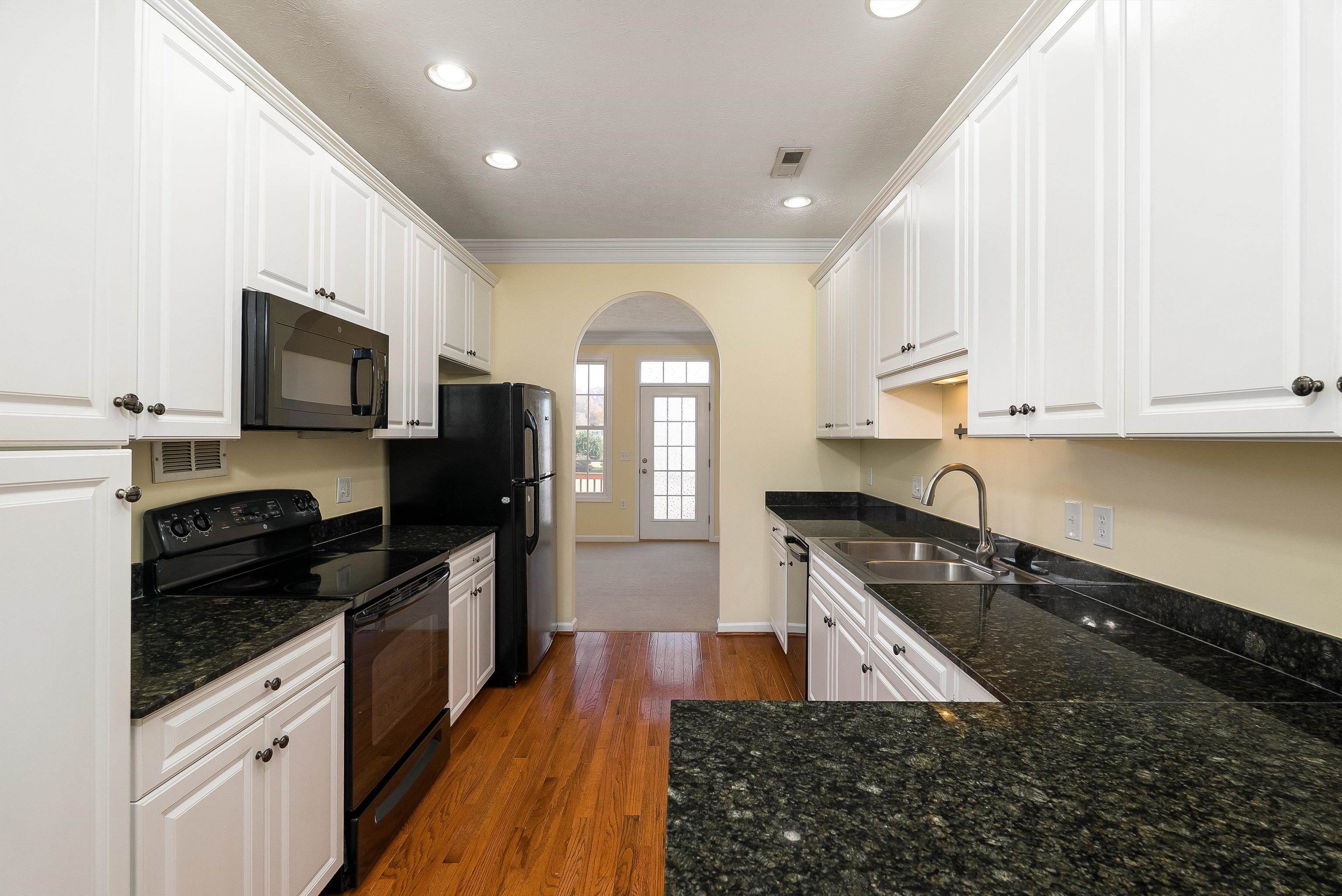 1439 Flowing Spring Lane Harrisonburg, VA 22801 - Photo 14 of 44 a kitchen with granite countertop stainless steel appliances and cabinets