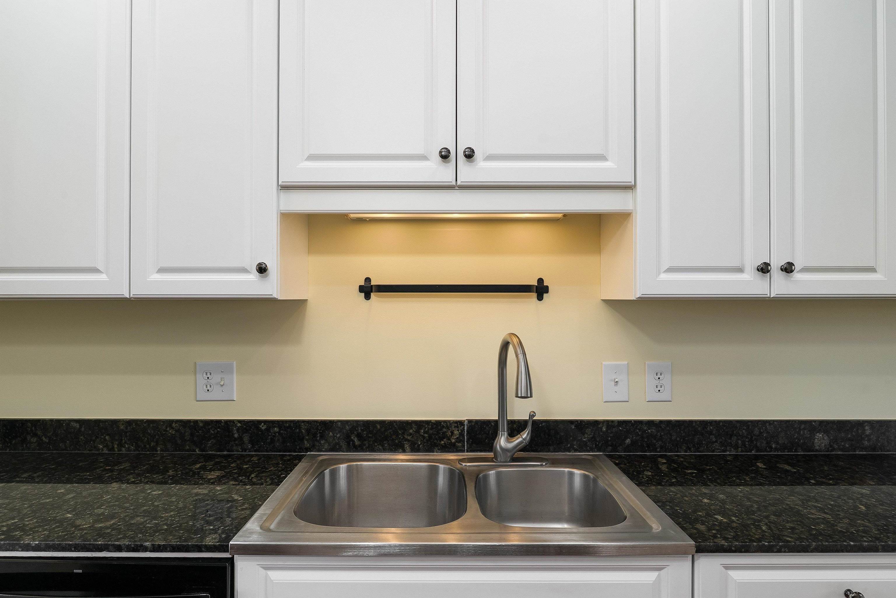1439 Flowing Spring Lane Harrisonburg, VA 22801 - Photo 16 of 44 a kitchen with a sink and cabinets