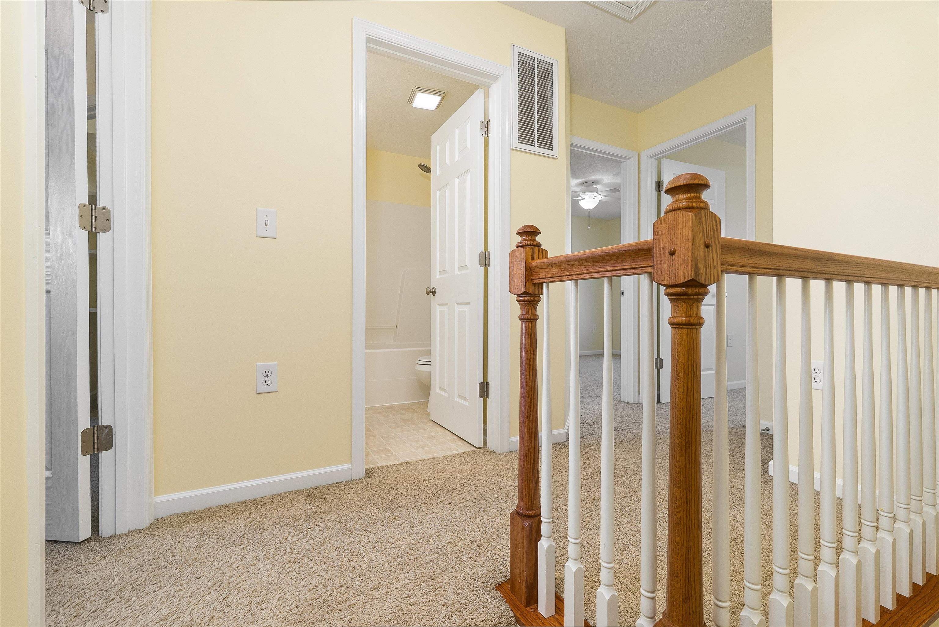 1439 Flowing Spring Lane Harrisonburg, VA 22801 - Photo 21 of 44 a view of a hallway with a door and stairs